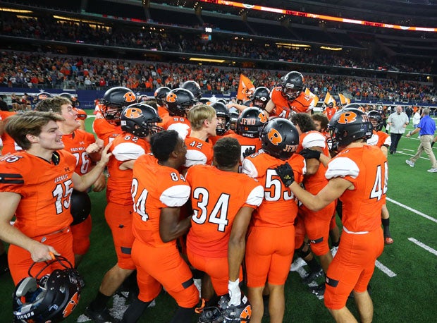 Rockwall players celebrate their wild win over Allen. 