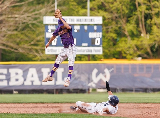 Wilton's Max Jarvie slides in to second with his own safe call on senior night against Westhill. (Photo: Gretchen McMahon)