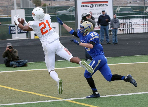 Bishop Gorman receiver Cordell Broadus makes a diving catch for one of his two receiving touchdowns.