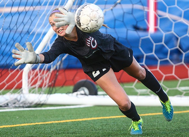 Chaparral (Colo.) goalie Lily Rawnsley makes a diving save on a shot by a Broomfield player during a first round CHSAA 5A playoff game.