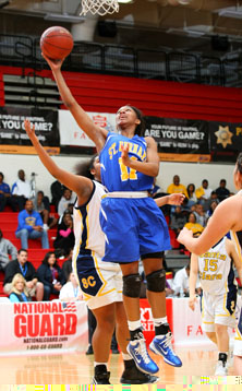 St. Bernard's LaJahna Drummer
is a huge threat down low.