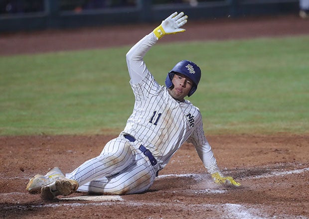 Gian De Castro slides into home to help give North Broward Prep of Florida a key win over Lewisburg of Mississippi last week. (Photo: Duane Bierman)