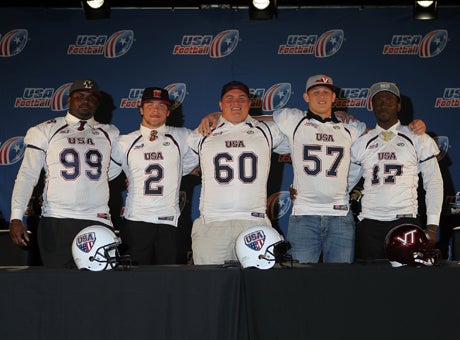 Tevin Montgomery (99), Shane Cockerille (2), Austin Droogsma (60), Wyatt Teller (57) and Lance Virgile (17) pose during the 2013 USA Football Signing Day Breakfast at The Renaissance Hotel Austin on Wednesday.