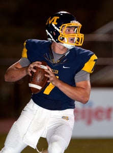 Moeller quarterback Spencer Iacovone
accounted for four touchdowns. 