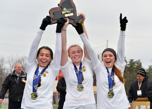 Massapequa was the 2014 NYSPHSAA Class AA girls soccer champion. It successfully defended its title last weekend in Cortland as teams from Long Island captured three of the five championships.