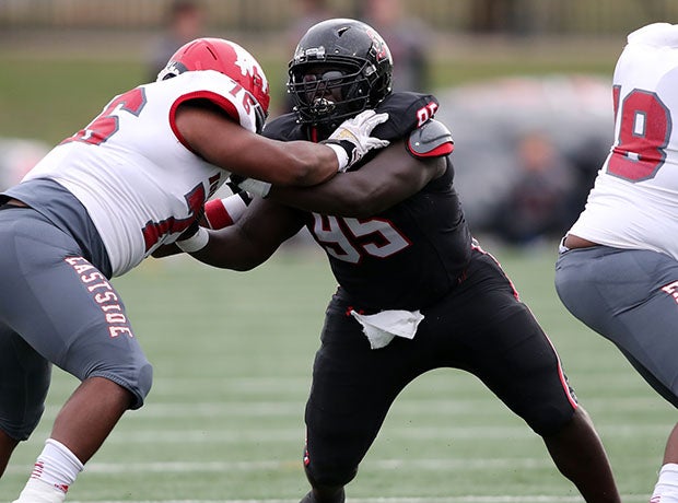 Jacob Henry battles at the line of scrimmage during last year's Class 6A Division I semifinal matchup with North Shore.