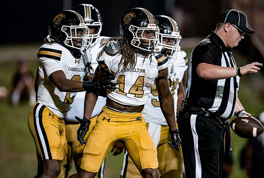 Zachary Watts (14) and Carrollton ran roughshod on Baton Rouge Catholic over the weekend, putting up 60-plus points for the second week in a row. (PHOTO: Josh Ankeny)