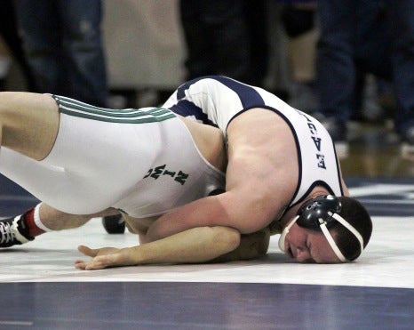 Broomfield's Phil Downing, right, will go for his fourth state wrestling title this weekend. The senior would become only the 17th four-timer in Colorado history.