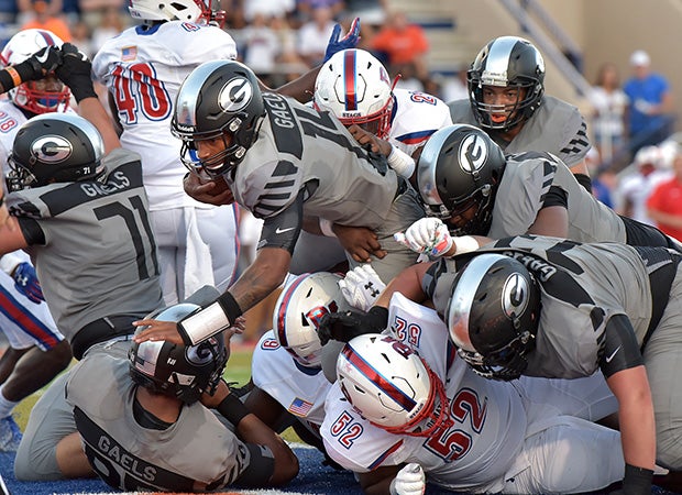 Gorman quarterback Dorian Thompson-Robinson powers home for a second-quarter touchdown run. 