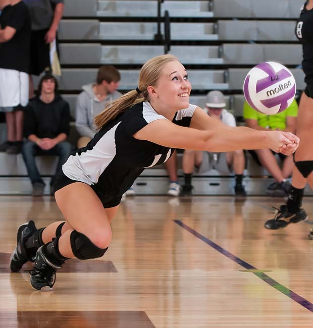 Douglas County's (Colo.) Ally Clancy dives for a dig during a match against visiting Rock Canyon in September.