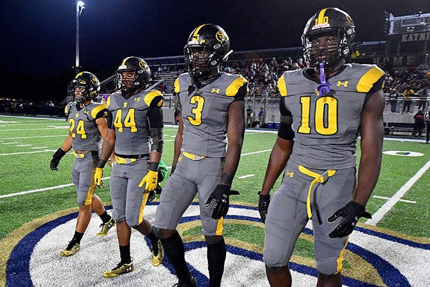 St. Frances Academy captains take the field for the coin toss prior to a 2019 game against Mater Dei.
