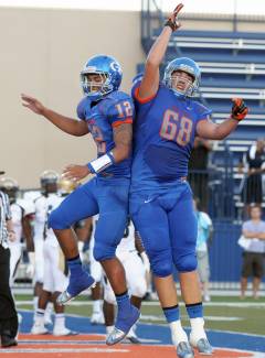 Bishop Gorman celebrated a victory overOur Lady of Good Counsel.