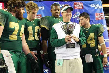 Grayson coach Mickey Conn celebrates with his team. 