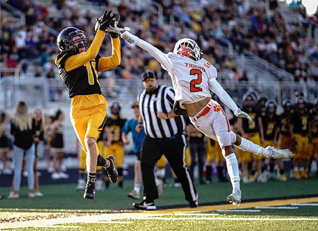 Union (Utah) receiver Chandler Culp makes a leaping touchdown catch in front of Ogden cornerback Jaden Gallegos.