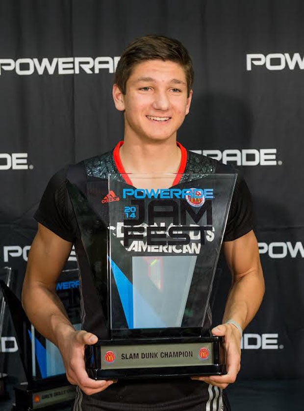 Providence (Jacksonville, Fla.) senior Grayson Allen holds up the hardware for winning the prestigious slam dunk contest in the Powerade Jam Fest Monday in conjunction with the McDonald's All-American game. The skills and dunk contest took place at the University of Chicago. The games will be played Wednesday at the United Center.  