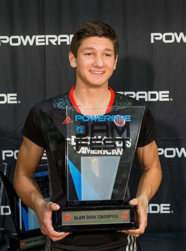 Providence (Jacksonville, Fla.) senior Grayson Allen holds up the hardware for winning the prestigious slam dunk contest in the Powerade Jam Fest Monday in conjunction with the McDonald's All-American game. The skills and dunk contest took place at the University of Chicago. The games will be played Wednesday at the United Center.