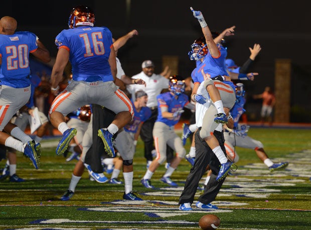 Nicco Fertitta (4) is lifting into the air after making game-saving sack and forced fumble in Bishop Gorman's 23-20 overtime win over Bingham earlier this season. Gorman (5-0) hosts St. John Bosco (3-0) Friday in a game that could decide a mythical national championship.