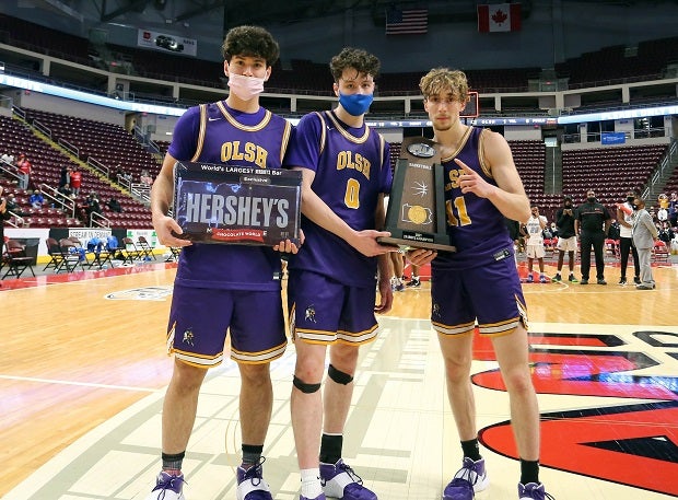 Our Lady of the Sacred Heart players celebrating their Pennsylvania 2A title last season. The Chargers have the longest active boys basketball win streak at 58 games stretching over three seasons.