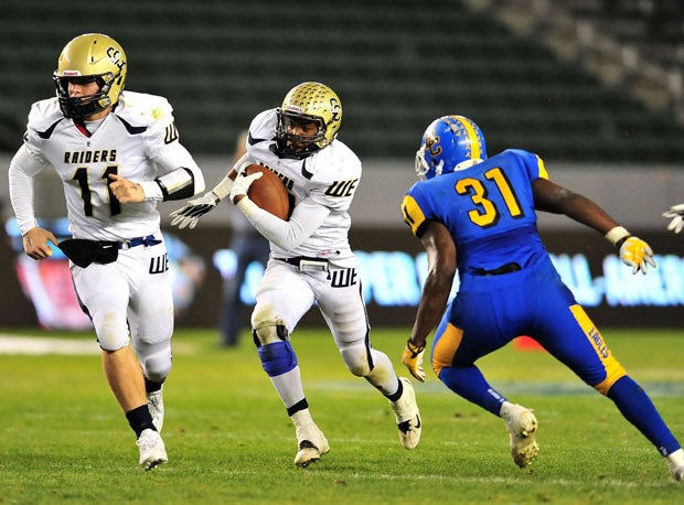 Central Catholic running back Reggie Bland breaks loose. He finished with 17 carries for 88 yards and a touchdown.
