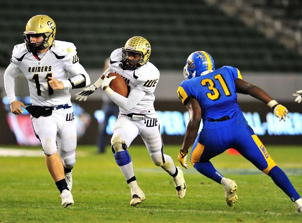 Central Catholic running back Reggie Bland breaks loose. He finished with 17 carries for 88 yards and a touchdown. 