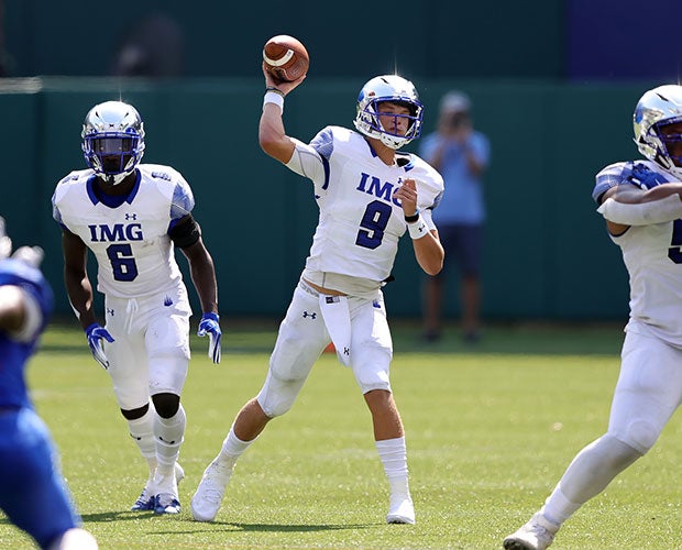 IMG Academy quarterback J.J. McCarthy threw three touchdown passes Saturday as the top-ranked Ascenders beat No. 6 Duncanville 41-14 at Globe Life Park.