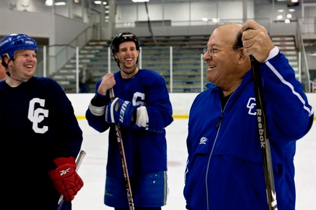 Catholic Central players enjoy fun exchange with Bowman on Sunday.