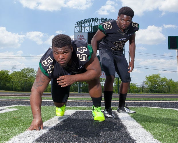 Defensive lineman Bryce English (left) and linebacker Chris Orr