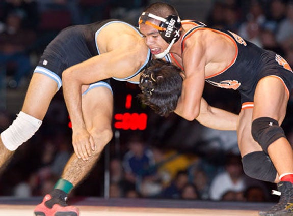 Selma's Alex Cisneros, shown here on the right side in last year's state final, almost pulled off the miraculous feat of becoming a four-time state champion. Nikko Villareal put an end to that Saturday.