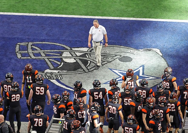 Tim Buchanan prepares to lead Aledo on to the field for the Class 5A Division I state championship game last December in Texas, his last as the program's head coach. Buchanan was 8-0 in state championship games. (Photo: Robbie Rakestraw)