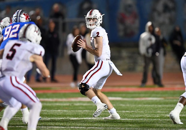 Lake Travis quarterback Bo Edmundson had a rushing and passing touchdown in the first half. 