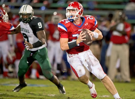 Give Cord Sandberg time to throw and it's usually bad news for opponents of Manatee, the nation's No. 1 team. Even with a little pressure from Central's De'Vante Duclos (9), Sandberg threw for 227 yards and three scores and Manatee won going away.
