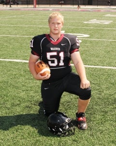 Dusty Swanson, a junior lineman from Wagoner (Okla.), is the brains behindthe X Collar. The device is designed toprevent horse collar tackles.