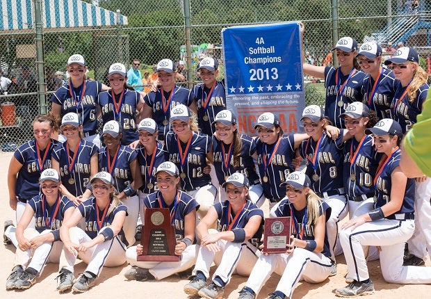 Alexander Central celebrates its 2013 title, part of a 95-game win streak for the Cougars.