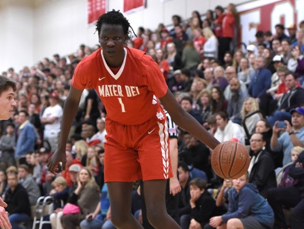 Bol Bol drives from the wing against Orange Lutheran on Friday night.