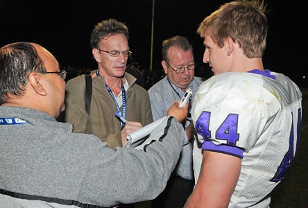 Jahn with the media after the record- breaking game. 