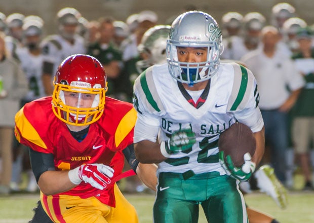Antione Custer scored three touchdowns and set up another with a 50-yard run for De La Salle.