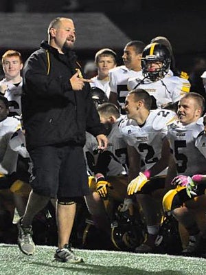 Coach Dave Bors rallies his team.