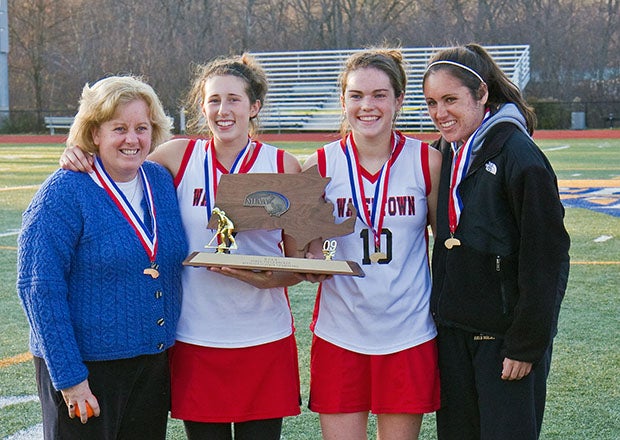Pictured here after winning a state title in 2009, Watertown field hockey coach Eileen Donahue (left) has led the school to 22 state championships and compiled a career record of 780-34-46. (PHOTO: Anthony Nesmith)