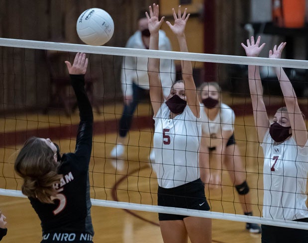 Some volleyball players are choosing to wear masks.