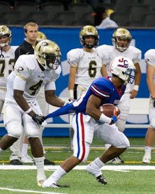 Sherman Badie simply would not go
down for Curtis against Plant.