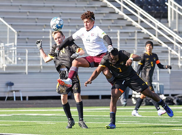 This months top photo features players scrambling for the ball during a 2-2 draw between Ennis and Crandall at the Forney Kickoff Tournament.