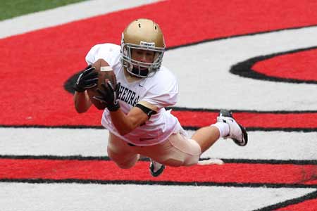 Indianapolis Cathedral's Wyatt Wood lays out for a fourth-quarter touchdown catch in Ohio State's stadium.