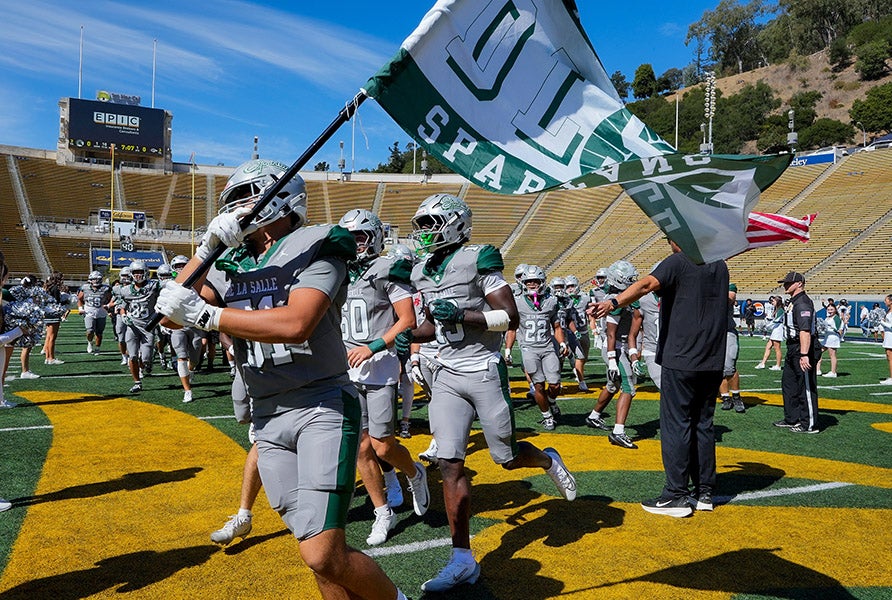 De La Salle takes the field Saturday at California Memorial Stadium. The Spartans will look to improve to 6-0 this week against Cathedral Catholic of San Diego. (PHOTO: Ernie Abrea)