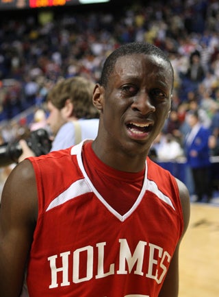 Brandon Housley of Holmes expresses his joy after
winning the Kentucky state championship.