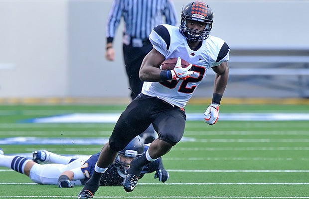 Johnathan Gray, a standout running back for Aledo and now Texas, may one day join the list of all-time great Dallas football players.