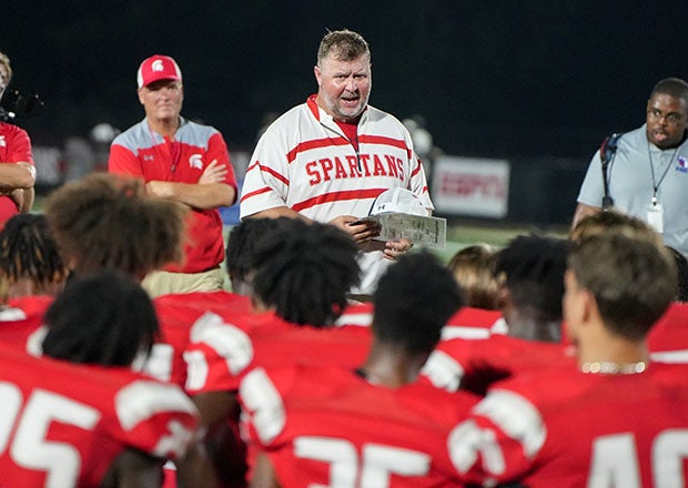 Saraland (Ala.) head coach Jeff Kelly talks to his team after a big win over Lipscomb Academy of Tennessee. The victory helped the Spartans earn a top 25 national ranking from three media outlets. (Photo: Brad Boland)