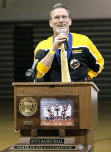 Dave Cresap earned praise by postinga 31-1 record at Perham. Buthis ability to guide his school,and his town, through tragedy iswhat earned him the MaxPreps MaleCoach of the Year award.