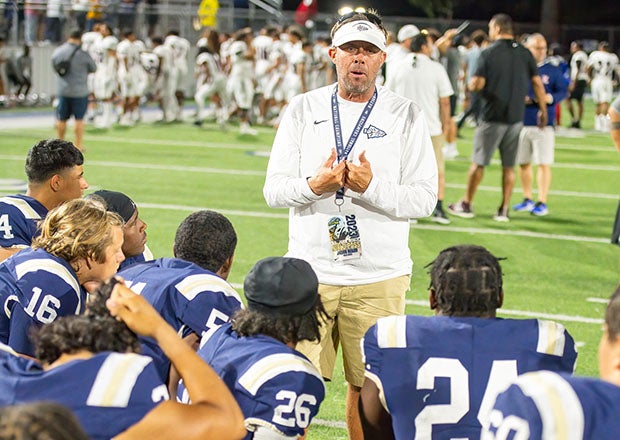 St. John Bosco head coach Jason Negro talks to his team following Friday's 42-22 win over Liberty. (Photo: Chris Harris)
