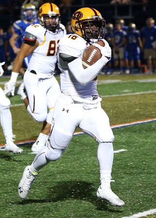 Ke'Shawn Churchwell scores on a 45-yard return
after he stripped a Reed receiver of the ball.