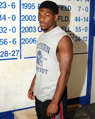 Newsome stands before history in Ansonia.